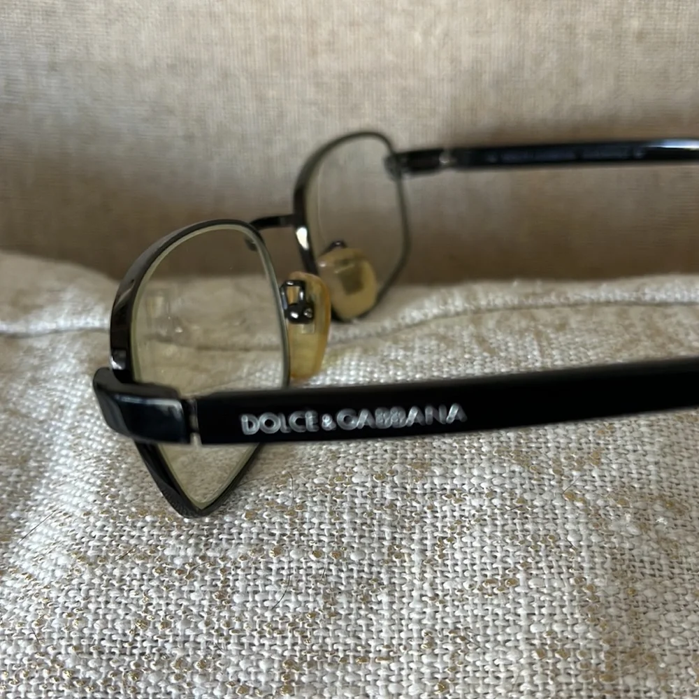 - Dolce and Gabbana black wire frame glasses